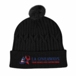 Sustainable cable knit beanie with a plush faux fur pom - Image 2