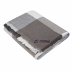 Woven buffalo check throw blanket with fringed edges